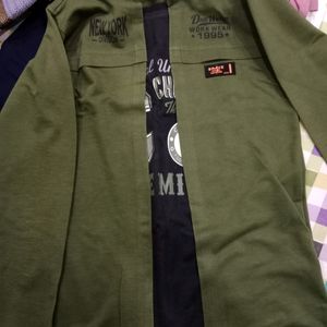 T Shirt Which Has An Attached Jacket