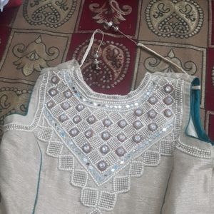 long embroided choli with plates skirt