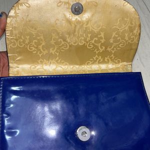 Gold Toned Blue Bag