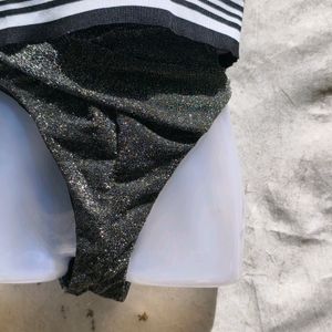 I. GLITTERY BLACK BRIEF