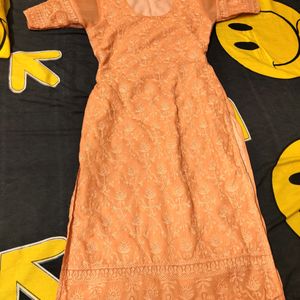 Beautiful Peach Kurti With Self Embroidery