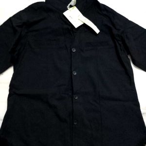 A Black Shirt With Good Or Excellent Quality.