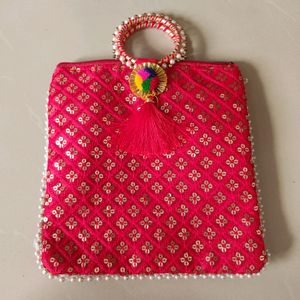 Red tassel Festive Handbag (Made Of Cloth )