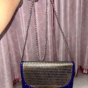 Gold Toned Blue Bag