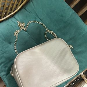 Miniso beige sling bag