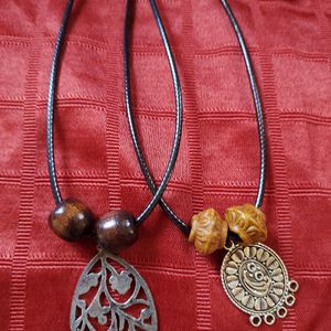 Oxidised pendants in long black thread