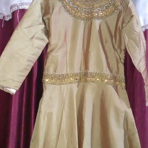 Golden Gown With Shining Stones