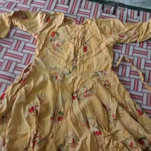 Yellow Cotton Frock With Print Design