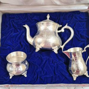 Antique Tea Set with silver polish