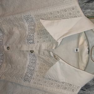 White Colored Shirt With Net Work On Front Sleeves