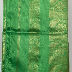 Green saree without blouse with zaree work