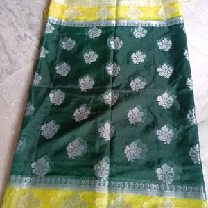 A Bottle Green Colour Saree With Yellow Border