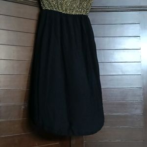 Women Black Off Shoulder Gold Shimmery Mini Dress