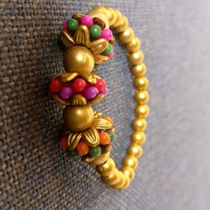 Cute Golden Bracelet With 3 Colourful Flowers