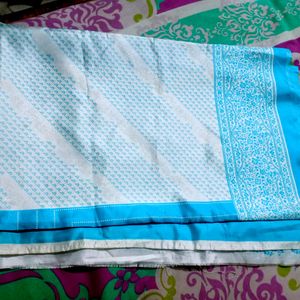 A Blue Silk Saree With Blouse And Peticoat