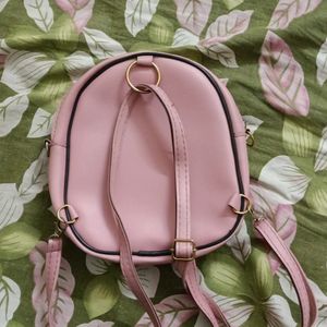 Two In One Sling/ Back Bag