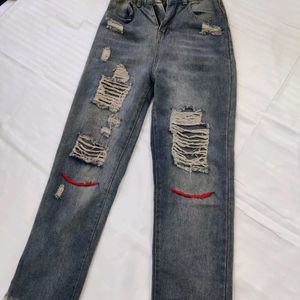 Women High-Rise Heavily Washed Distressed Jean