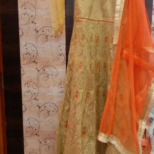 party wear golden and orange gown