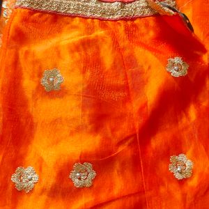 Selling Lehnga With Orange And Golden Colour