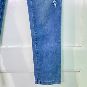 LIGHT BLUE RIPPED JEANS FOR WOMEN