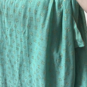 Sea Green Color Saree With Golden Blouse