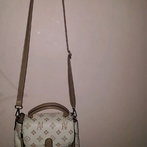 White And Cream Textured Sling Bag