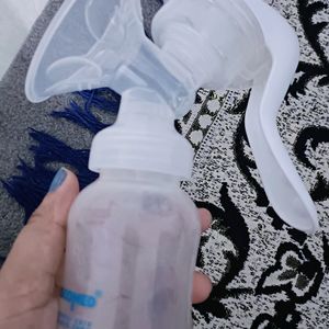 Breast Milk Pump, Nipple Shield And Bottle