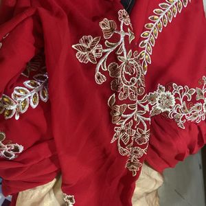 Beautiful Red & Golden Gown With Net Frills.