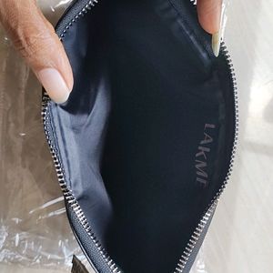 Lakme Black Pouch With Golden Detailing