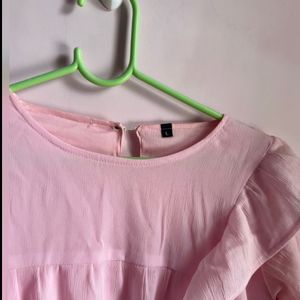 pink top,