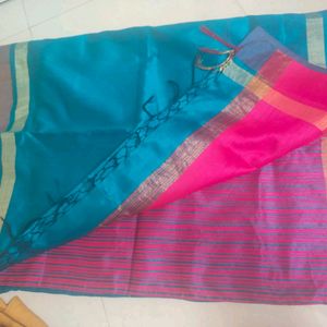 Bright Blue Silk Saree With Pink Border And Pallu