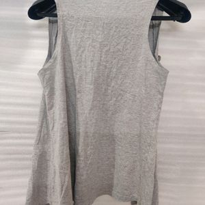 Grey Sleeveless Shrug With Button Holds