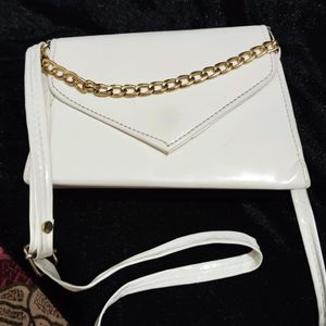 White Slingbag With Golden Chain And Superb Look