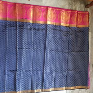 A Pattu Navy Blue nd Pink Coloured Saree.