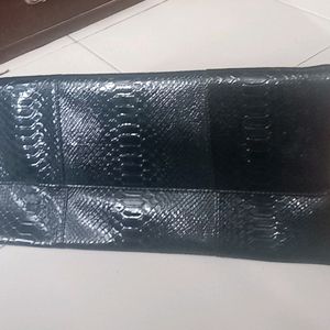 Price  Drop....Black crocodile leather sling bag