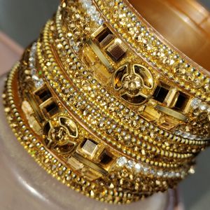 Bronze And Gold Toned Stoned Bangles Set Of 8