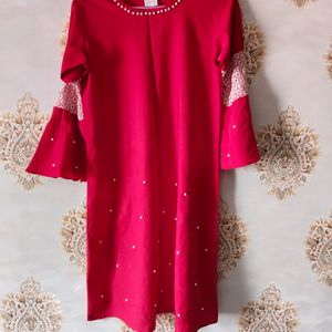 Read Peachy A Line Pearl Bead Kurti.