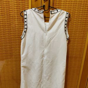 Koovs White sleeveless Top/Tunic by Udita