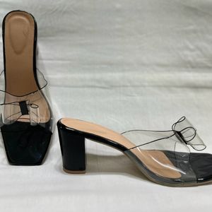 Black Heels With Bow On Front And Lip Gloss Combo