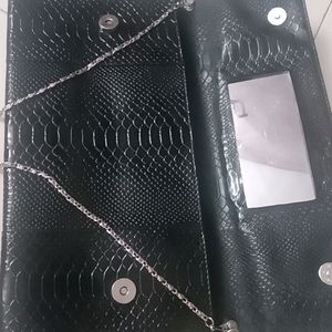 Price  Drop....Black crocodile leather sling bag