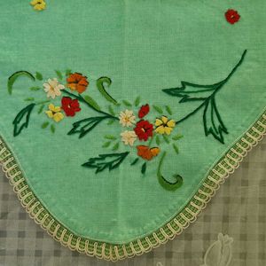 A Set of 3 hand embroidered table mats