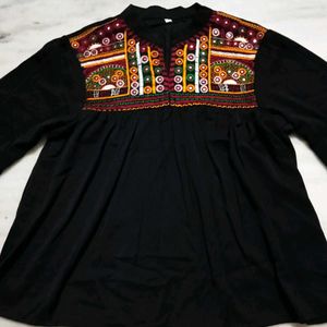 A Black Top With Good Or Excellent Quality