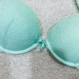 Light Green Color Puffy Bra Under Plastic Frame