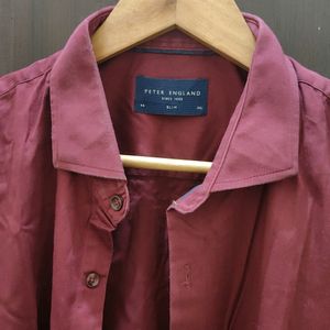 A Maroon Colour Shirt