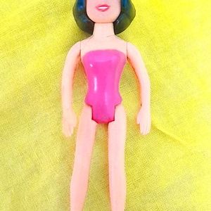 Mini Disney Doll With Rubber Costume