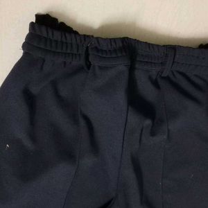 Straight pants with adjustable waistband