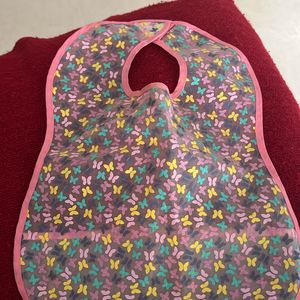 Preloved Mothercare Waterproof bib -flowers