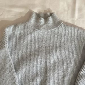 High neck woollen sweatshirt have a new collectio