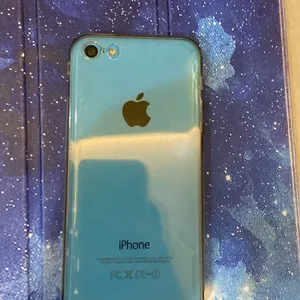 I Phone 5c With Cover and Earphones