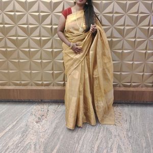 Gold tissue silk saree trending with stiched blous